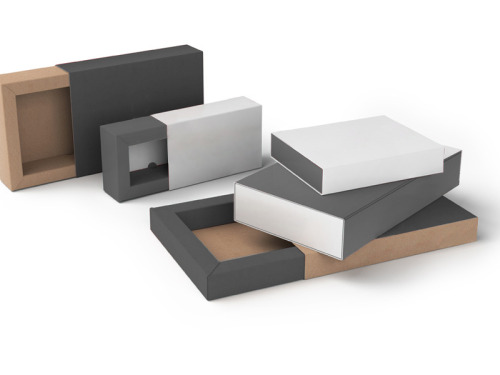 5 boîtes à tiroir rectangles de tailles et couleurs différentes sur fond blanc